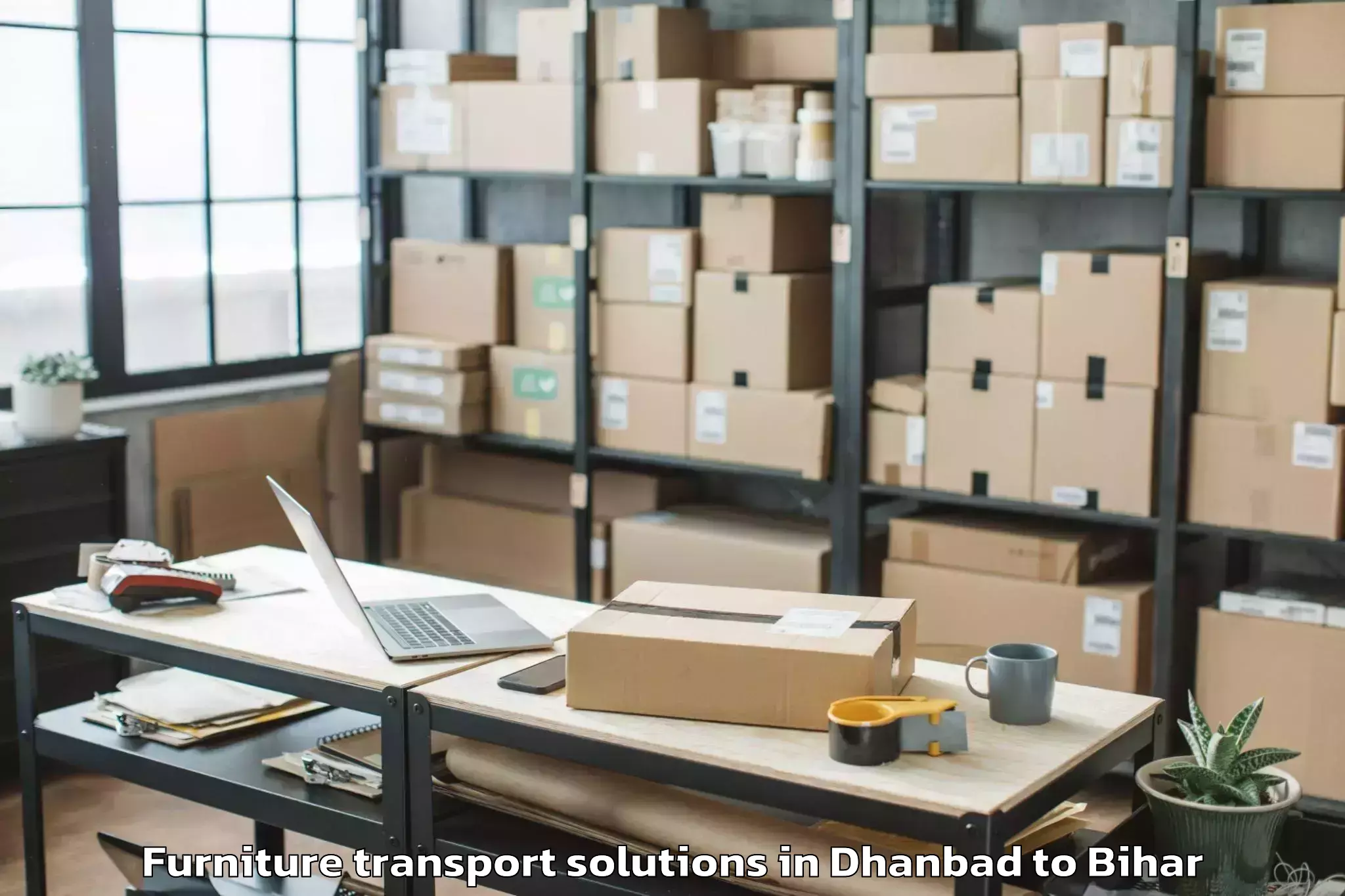 Affordable Dhanbad to Pipra Furniture Transport Solutions